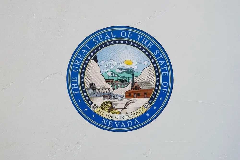 A blue seal of the Nevada state that represents their mineral resources